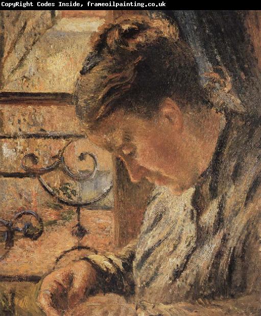 Camille Pissarro The Woman is sewing in front of the window
