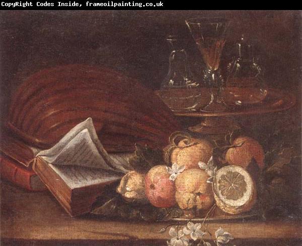 unknow artist Still life of a lute,books,apples and lemons,together with a gilt tazza with a wine glass and decanters,all upon a stone ledge